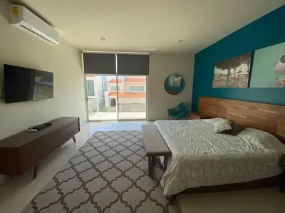 Cama o camas de una habitación en Hermosa casa de playa con vista al mar y albercas!