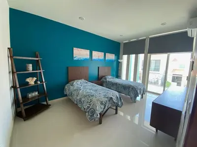 Cama o camas de una habitación en Hermosa casa de playa con vista al mar y albercas!