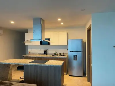 Una cocina o zona de cocina en Super depa sobre el malecon alberca infinity