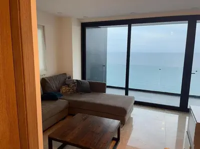 Zona de estar de Super depa sobre el malecon alberca infinity