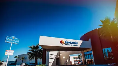 Certificado, premio, señal o documento que está expuesto en American Inn Hotel & Suites Delicias