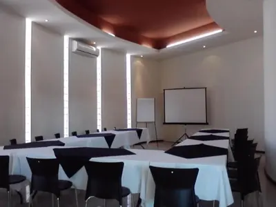 Zona business o sala de conferencias en American Inn Hotel & Suites Delicias