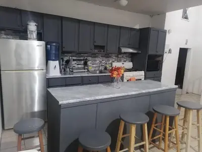 Una cocina o zona de cocina en Casa amplia