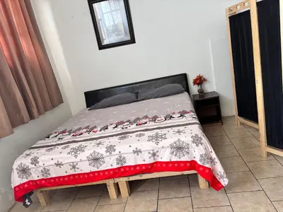 Cama o camas de una habitación en Casa amplia