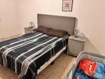Cama o camas de una habitación en Casa amplia