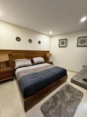 Cama o camas de una habitación en Hermoso Departamento a pie de playa en CAM