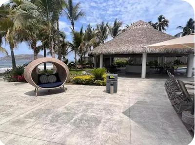 Jardín al aire libre en Hermoso Departamento a pie de playa en CAM
