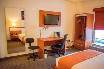 Cama o camas de una habitación en Los Herederos Hotel Piedras Negras