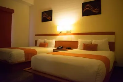Cama o camas de una habitación en Los Herederos Hotel Piedras Negras
