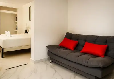 Cama o camas de una habitación en Sunset Suites Mazatlán at Lomas de Mazatlán