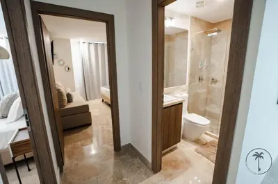 Un baño de Nice apartment with a pool and gym in Mazatlán