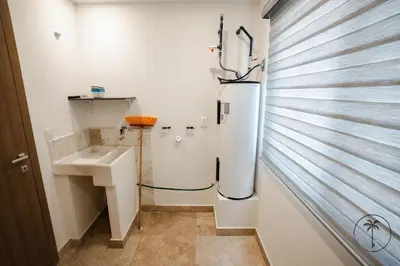 Una cocina o zona de cocina en Nice apartment with a pool and gym in Mazatlán