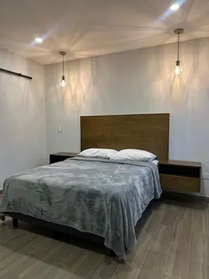 Cama o camas de una habitación en Depa del Carmen