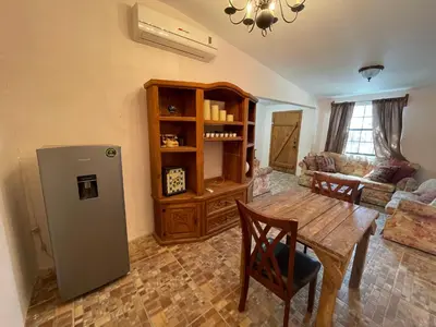 Una cocina o zona de cocina en Bonito departamento con dos habitaciones.