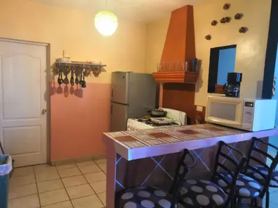 Una cocina o zona de cocina en Garimar Condominios en San Carlos