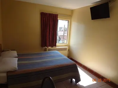 Cama o camas de una habitación en Hotel Olivia