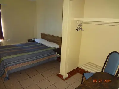 Cama o camas de una habitación en Hotel Olivia