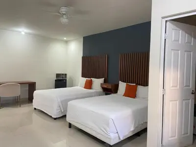 Cama o camas de una habitación en Hotel NUVE EXPRESS