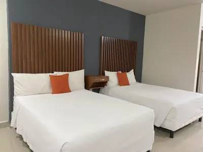 Cama o camas de una habitación en Hotel NUVE EXPRESS