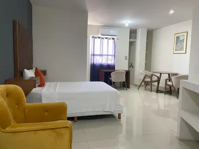 Cama o camas de una habitación en Hotel NUVE EXPRESS