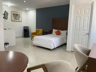 Cama o camas de una habitación en Hotel NUVE EXPRESS