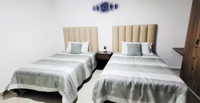 Cama o camas de una habitación en Torre Alba 103