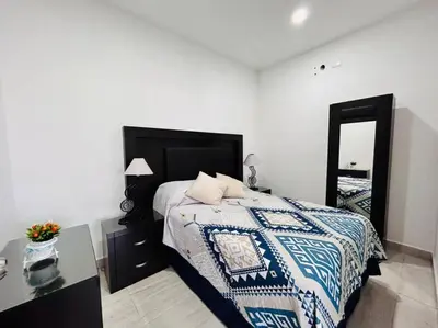 Cama o camas de una habitación en Aleman 13, Centrico depa cerca de la playa
