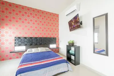 Cama o camas de una habitación en Penthouse Con Terraza en Zona Dorada
