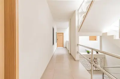 Cama o camas de una habitación en Lujoso Condominio Tiburon a 3 Cuadras de la Playa