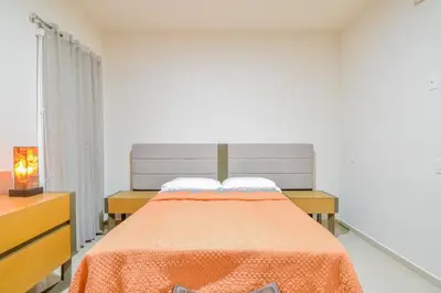 Cama o camas de una habitación en Bonito condo Zona Dorada con Piscina y Cochera