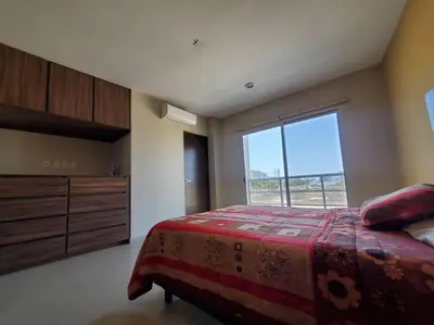 Cama o camas de una habitación en Grande Condo 1 Cuadra de Playa