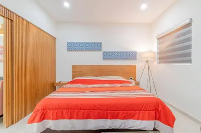 Cama o camas de una habitación en LOFT Lujoso y Moderno Con Cama King en Centrico Historico