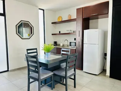 Una cocina o zona de cocina en 3 minutos de playa malecon by G P S rentas