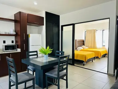 Una cocina o zona de cocina en 3 minutos de playa malecon by G P S rentas