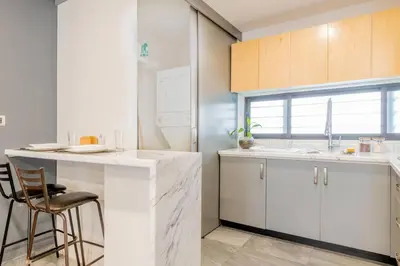 Una cocina o zona de cocina en Tokio Loft Loft Moderno en Centro de Durango