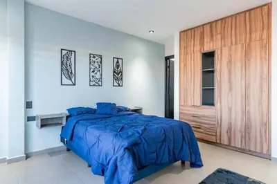 Cama o camas de una habitación en Depa Industrial Moderno y Comodo