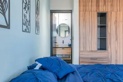 Cama o camas de una habitación en Depa Industrial Moderno y Comodo