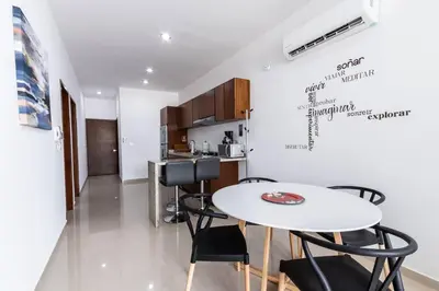 Una cocina o zona de cocina en Departamento a 2 minutos de la playa by G P S rentas