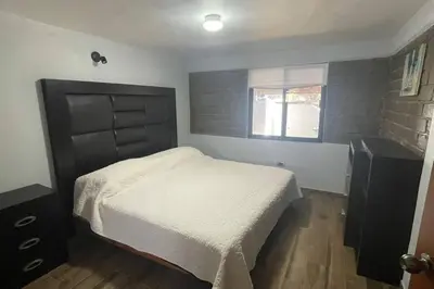 Cama o camas de una habitación en Cabaña Alpina