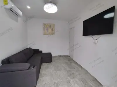 Una televisión o centro de entretenimiento en Casa Cosmos 'Alberca Privada'