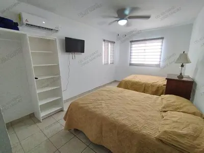Cama o camas de una habitación en Casa Cosmos 'Alberca Privada'