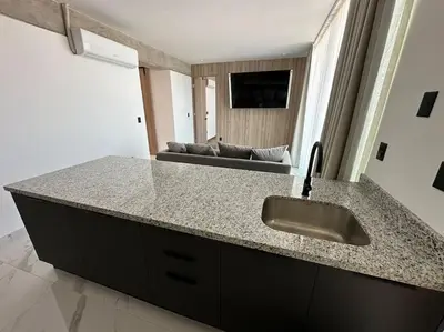 Una televisión o centro de entretenimiento en Loft en WTower 503 Mazatlan