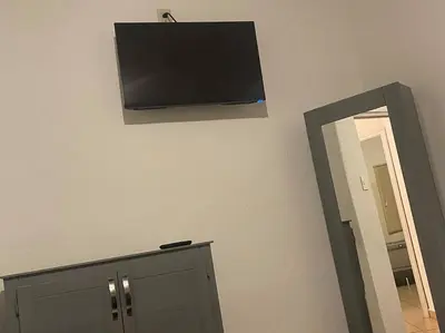 Una televisión o centro de entretenimiento en Departamento Arizona apartment Cercano a Consulado y puentes internacionales