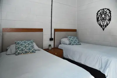 Cama o camas de una habitación en Sealion Dive Center