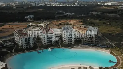 Piscina en o cerca de Lujo en Crystal Lagoons: Paraíso para la familia.