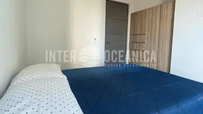 Cama o camas de una habitación en Lujo en Crystal Lagoons: Paraíso para la familia.