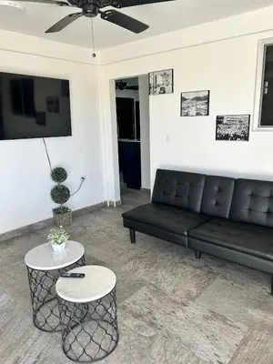 Zona de estar de HOTEL and Suites Cananea