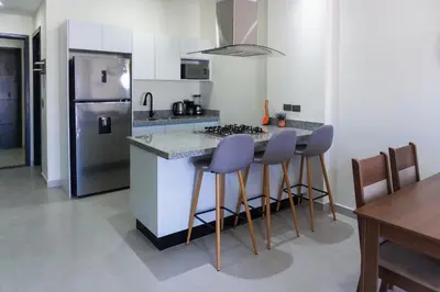 Una cocina o zona de cocina en Spacious family apartment in Mazatlán