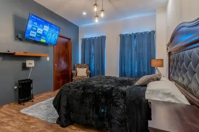 Cama o camas de una habitación en Elegante Condo CentroHistórico con Cochera
