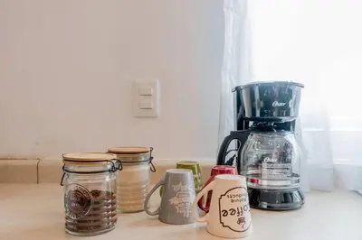 Utensilios para hacer té y café en Elegante Condo CentroHistórico con Cochera